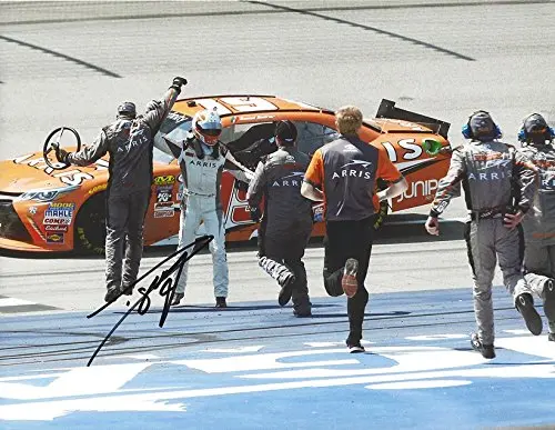 Autographed 2016 Daniel Suarez #19 Arris Team Michigan Race Win (Victory Celebration With Pit Crew) Xfinity Series Joe Gibbs Racing Signed Collectible Picture Nascar 9X11 Inch Glossy Photo With Coa 1