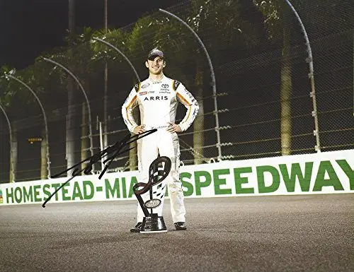 Autographed 2016 Daniel Suarez #19 Arris Team Xfinity Series Champion (Homestead Speedway Trophy Pose) Joe Gibbs Racing Signed Collectible Picture Nascar 9X11 Inch Glossy Photo With Coa 1