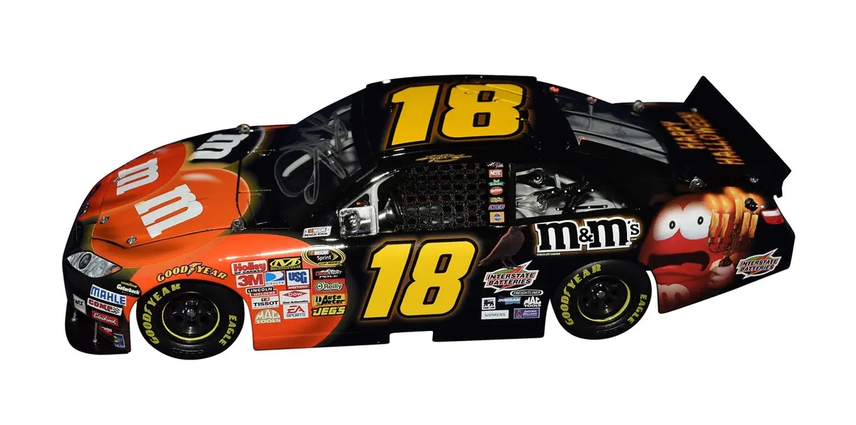 Autographed 2010 Kyle Busch #18 M&M's Racing Halloween Car (Joe Gibbs Racing Toyota) Signed Lionel 1/24 Scale Nascar Diecast Car With Coa (#642 Of Only 904 Produced) 2