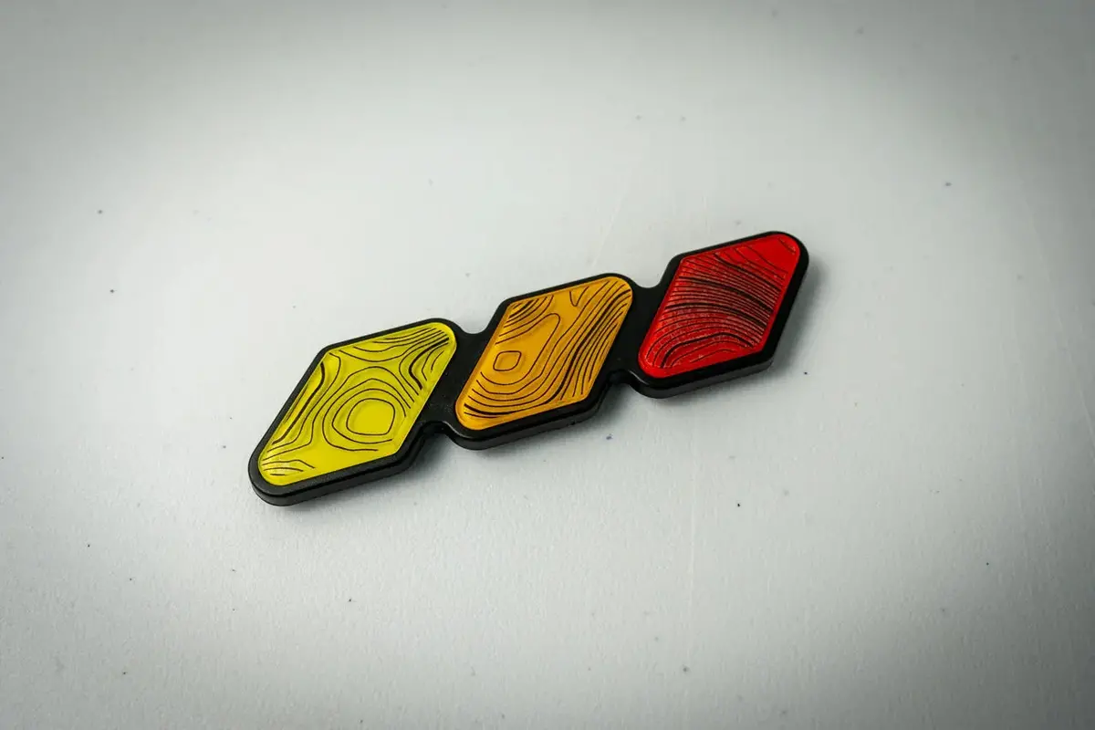 Tri Color Topographic Grille Emblem - 2024+ Land Cruiser / 2016-2013 Tacoma 1